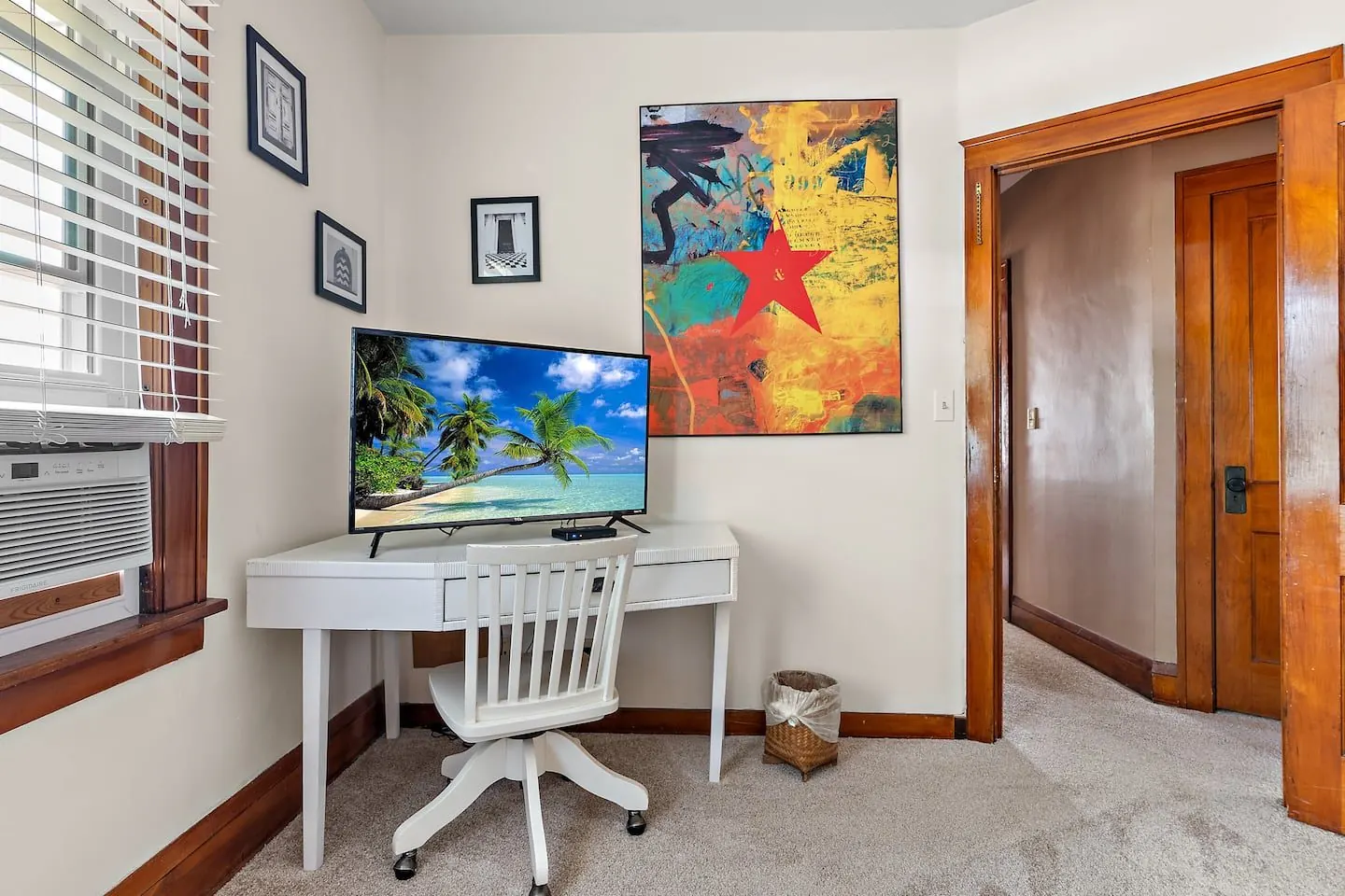 Dedicated desk and chair with a television